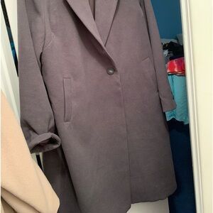 Beautiful grey wool coat. NEVER worn .Longer style, below knee.
